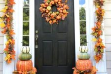26 pumpkin topiaries, a leaf garland,a fall wreath with mini gourds