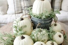 a basket with white pumpkins, fresh greenery is great for a neutral fall space, it can be a nice decor idea