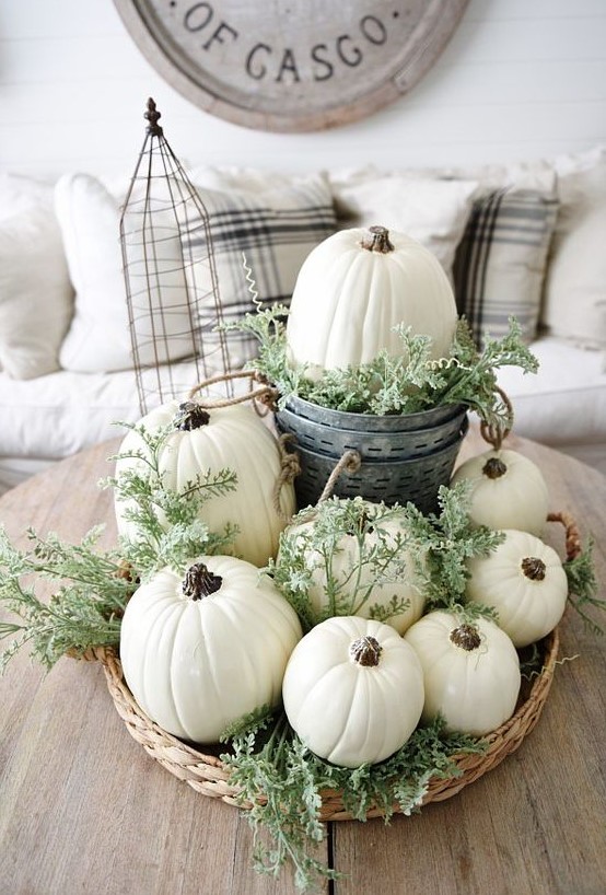 a basket with white pumpkins, fresh greenery is great for a neutral fall space, it can be a nice decor idea