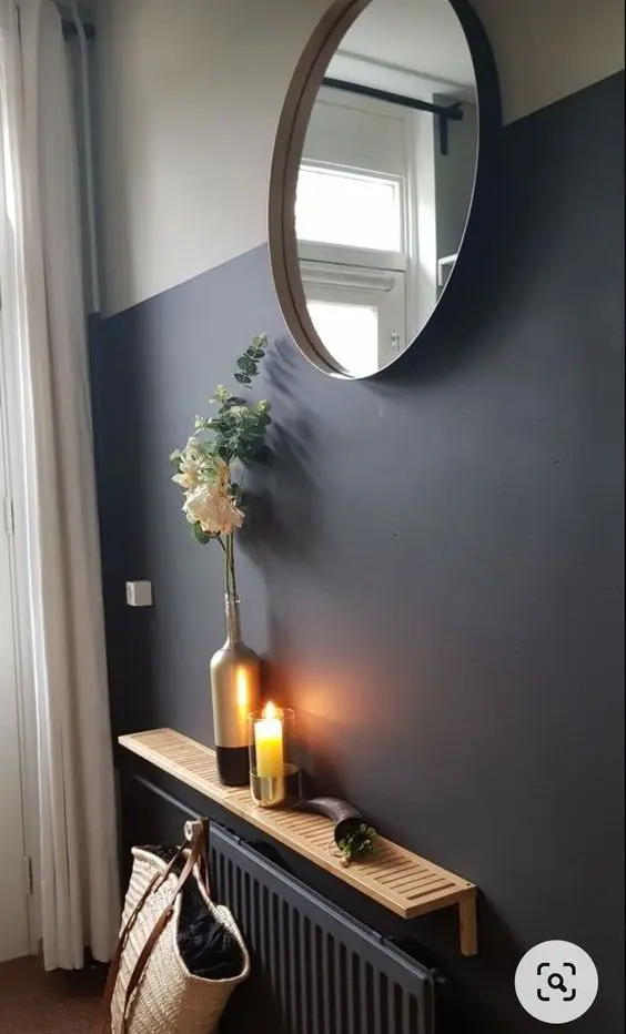 a lovely way to hang a round mirror