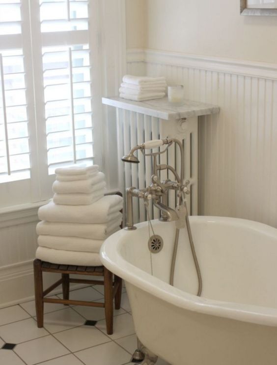 a stylish way to make a radiator in a small bathroom practical