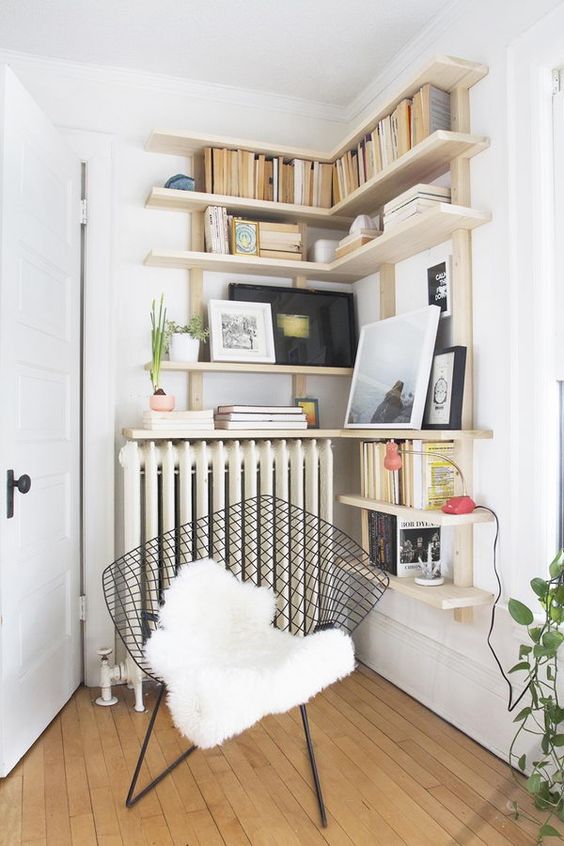 built-in corner shelves over the radiator to make it look cohesive, as part of this unit
