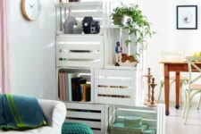 DIY whitewashed crate space divider that functions as a shelf