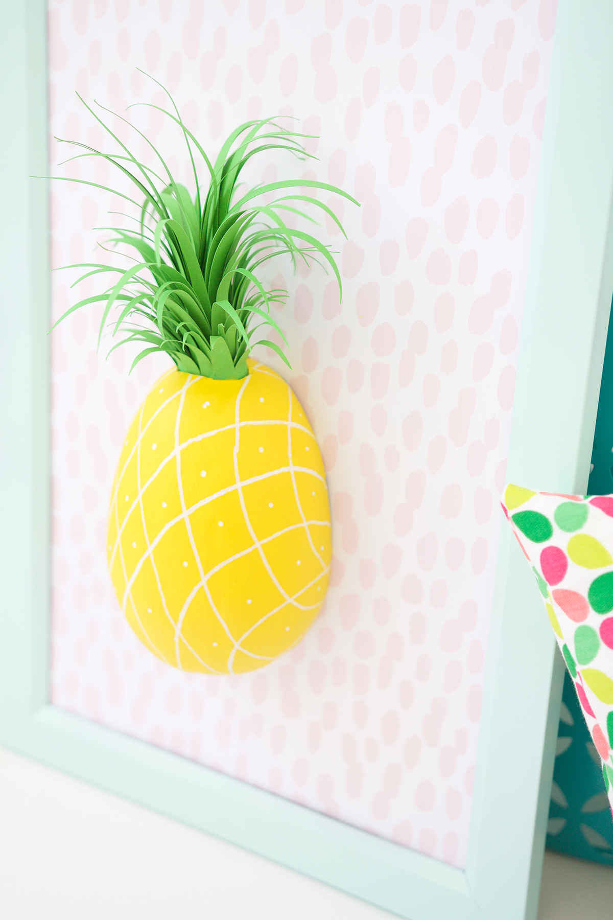 DIY paper mache pineapple wall art in a frame