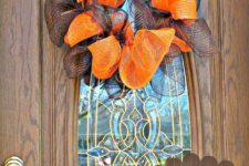 DIY brown and orange mesh wreath with no decorations