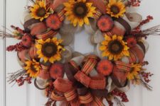 DIY wreath mad eof several types of mesh and faux pumpkins