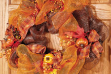 DIY fall-colored deco mesh wreath with faux veggies