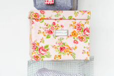 DIY storage boxes covered with fabric and paper