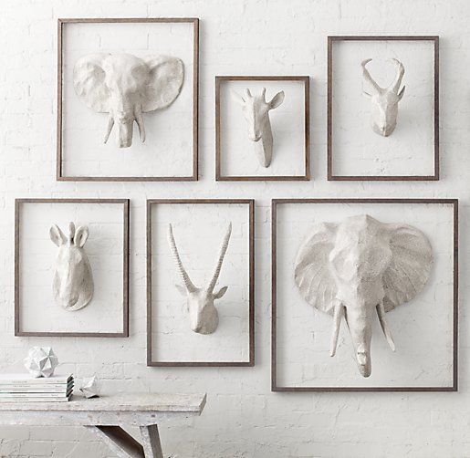 selection of safari-themed paper mache animals in frames will be a nice decoration for every space