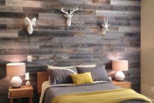 07 weathered wood wall looks amazing with small white faux heads