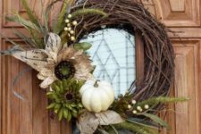 08 faux leaves and a pumpkin on this simple wreath look gorgeous