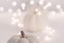 08 mix white pumpkins with lights for elegant and lively fall decor