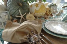 09 Thanksgiving table with a crab napkin ring and cool nautical pumpkins