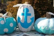 11 bold turquoise and blue pumpkins with various patterns