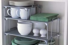 11 stackable shelves will give you the most of your kitchen cabinets