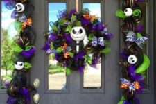 12 bold purple and green deor with white pumpkin faces