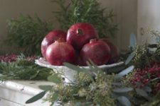 12 simple pomegranate centerpiece on a white dish