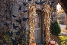13 corn husks on the sides and a flock of ravens over the door