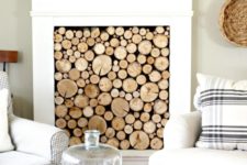 14 faux wood log panel to make a fireplace look cool