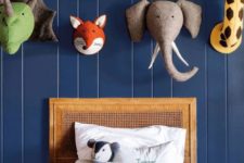 14 highlight the headboard wall with colorful soft animal heads