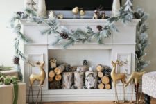 15 faux fireplace decorated with logs, pinecones and a garland