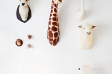 15 nursery with faux animal heads mounted on wall
