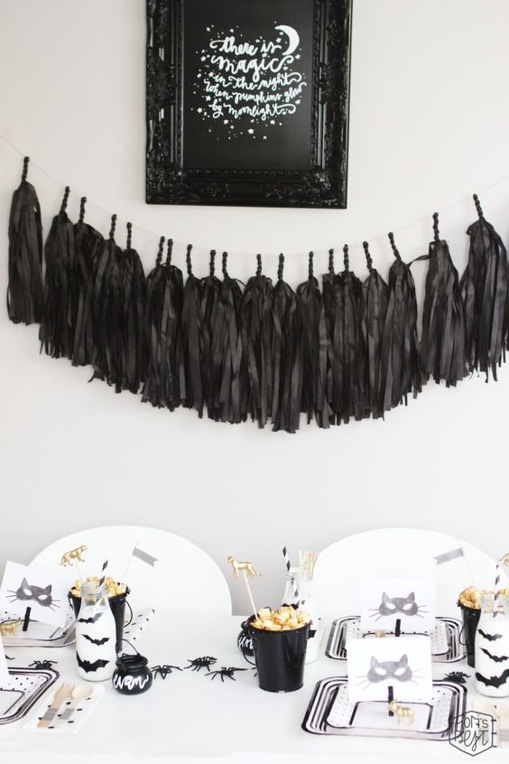 modern kids' Halloween party table in black and white