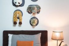 16 take parts of stuffed animals and attach them to the wall yourself