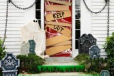 18 cemetry-inspired porch decor with Keep Out door decor