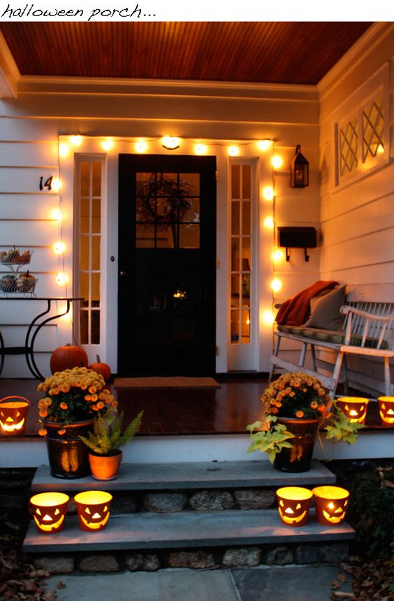 large lights attached over the front door make your entryway inviting