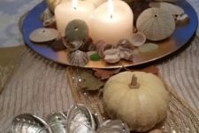 20 dish display with candles, sea urchins, oysters and shells