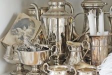 21 vintage silver collection arranged on shelf
