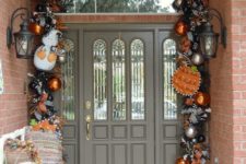25 Halloween arch in black and orange with Christmas ornaments and deco mesh