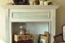 25 vintage suitcases and framed pictures to make a decor feature