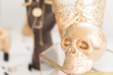 DIY gilded styrofoam skulls