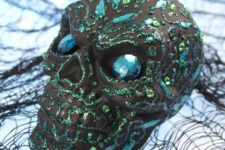 DIY skulls decorated with glitter and gems