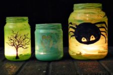 DIY painted Halloween lanterns from mason jars