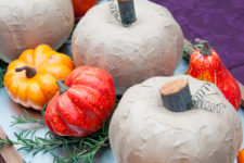 DIY dollar store pumpkins decorated in a creative way
