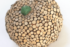 DIY wood slice covered pumpkin