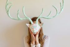 DIY paper mache deer head covered with pastel fabric