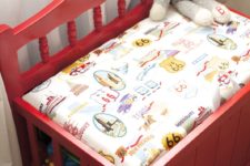 DIY upholstered toy chest of an old crib