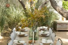 neutral and natural tablescape with pears, leaves and a burlap table runner