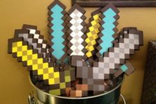 06 handmade Minecraft swords using free printable sword cut out and glued to double foam board