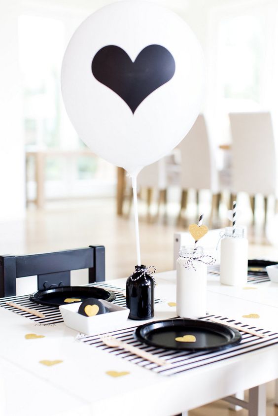 black and white table setting for a romantic occasion