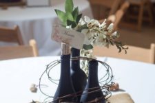 07 chalkboard wine bottles with vine and fresh flowers