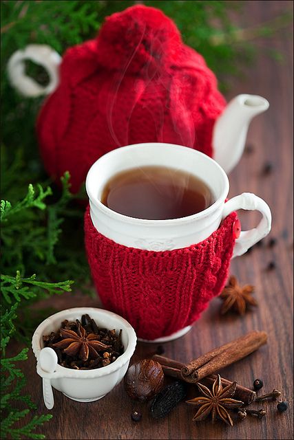 knit some red tea pot and cup cozies to keep the tea hot, give them as favors, too