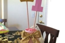 11 pink and gold princess party centerpiece