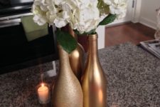 13 paint some bottles with gold, and other with glitter gold and add white flowers