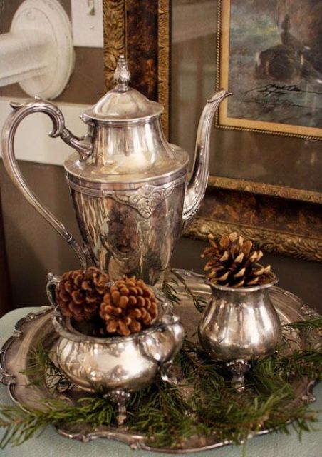 a silver coffeeware set with evergreens and pinecones will be a nice idea for an exquisite Christmas tea party