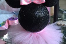 15 Minnie Mouse styrofoam head painted black and glittered with a pink tutu skirt